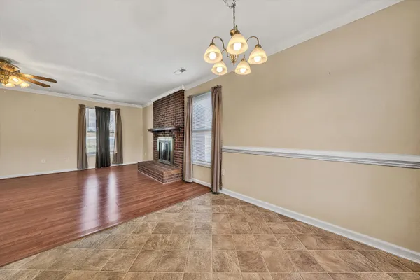 a view of a hallway with a chandelier