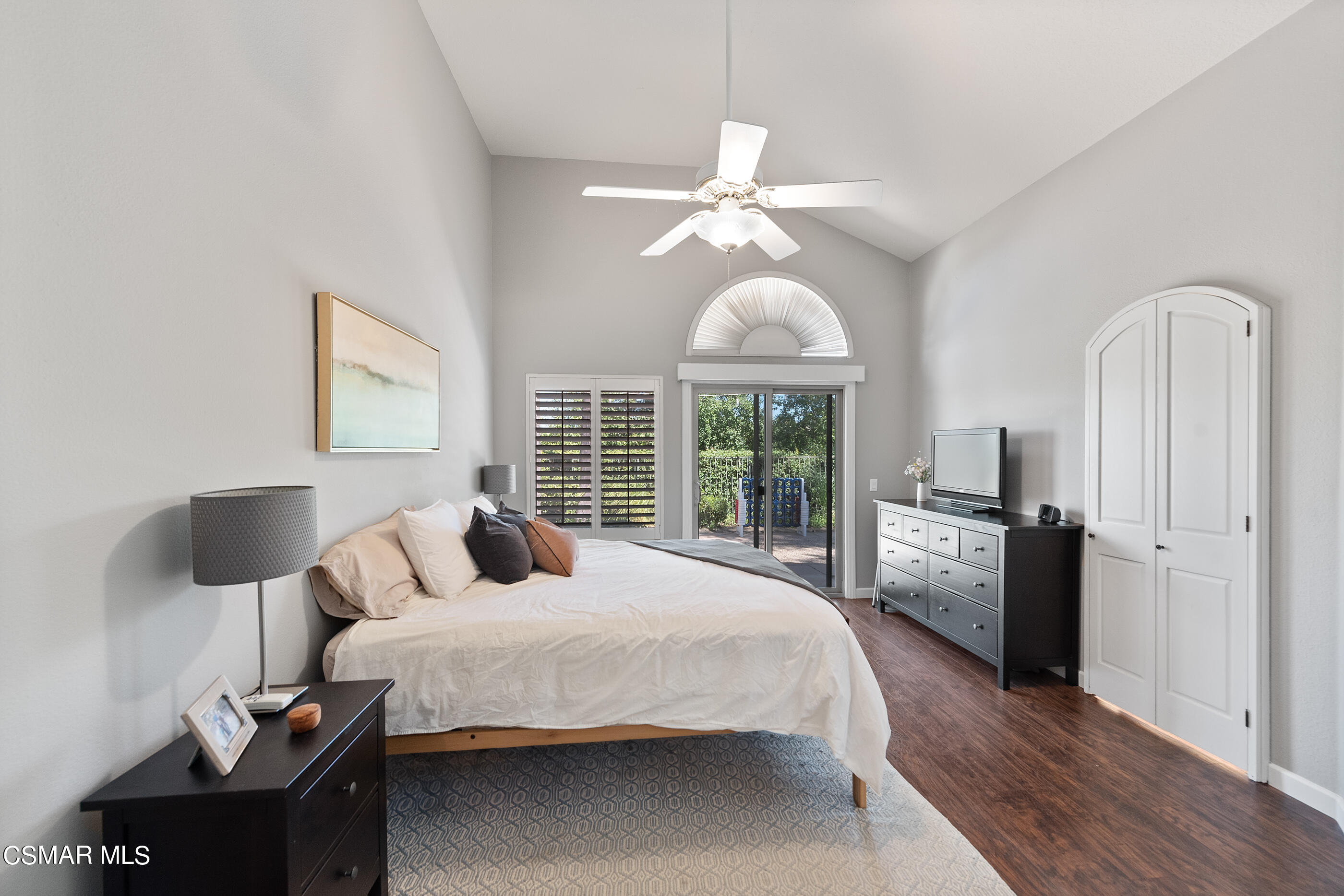 472 Fresh Meadows Road Simi Valley, CA 93065 - Photo 23 of 33 a bedroom with a large bed and a chandelier