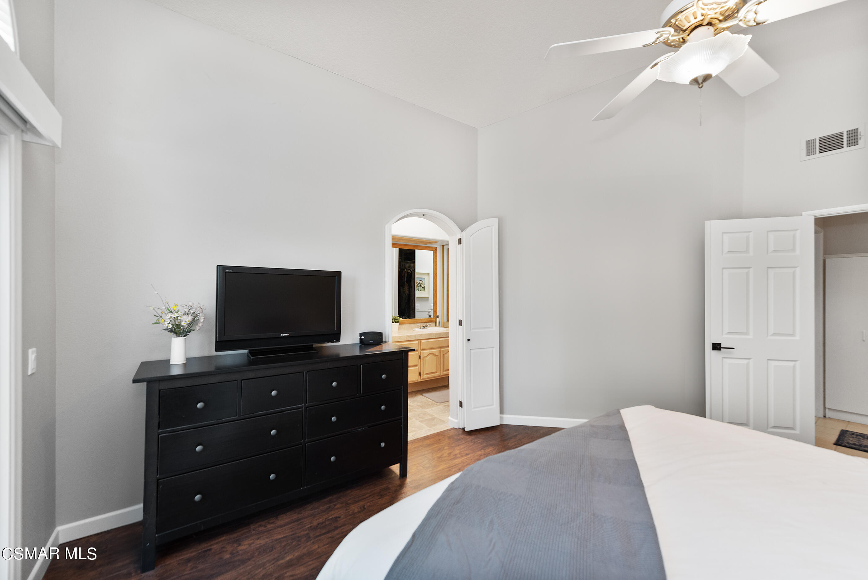 472 Fresh Meadows Road Simi Valley, CA 93065 - Photo 24 of 33 a bedroom with a bed and a flat screen tv