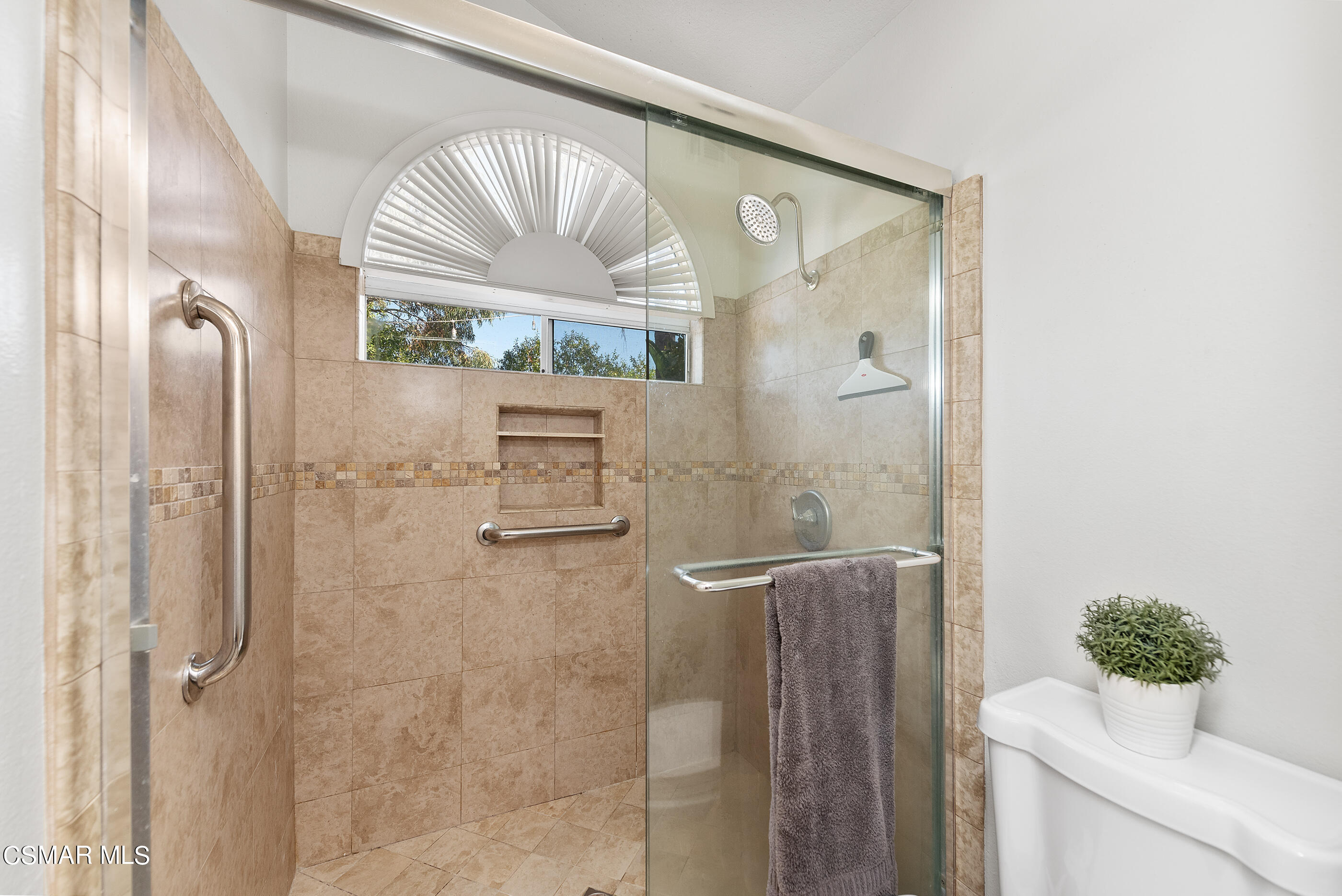 472 Fresh Meadows Road Simi Valley, CA 93065 - Photo 25 of 33 a bathroom with a granite countertop shower a mirror and a sink
