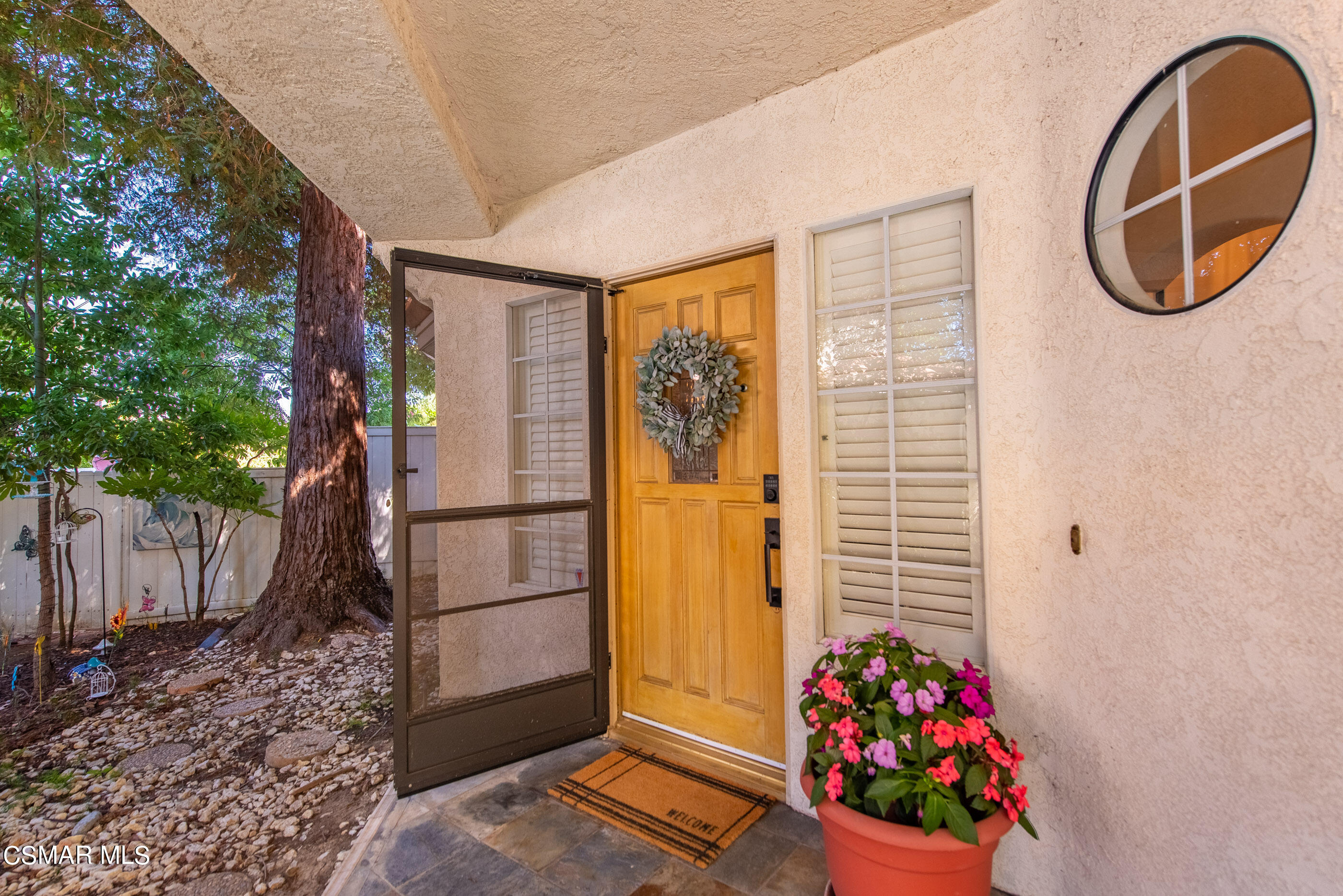 472 Fresh Meadows Road Simi Valley, CA 93065 - Photo 3 of 33 a front view of a house with entryway