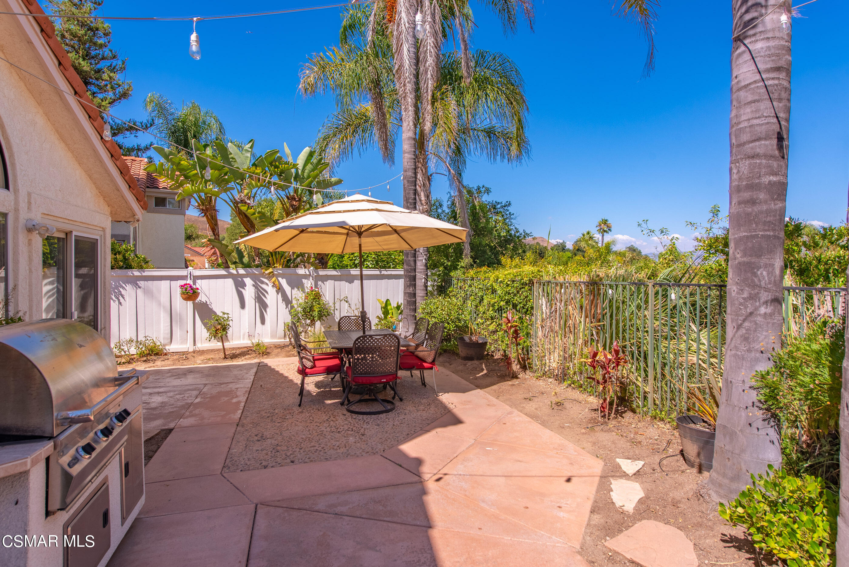 472 Fresh Meadows Road Simi Valley, CA 93065 - Photo 33 of 33 a view of backyard with outdoor seating and trees