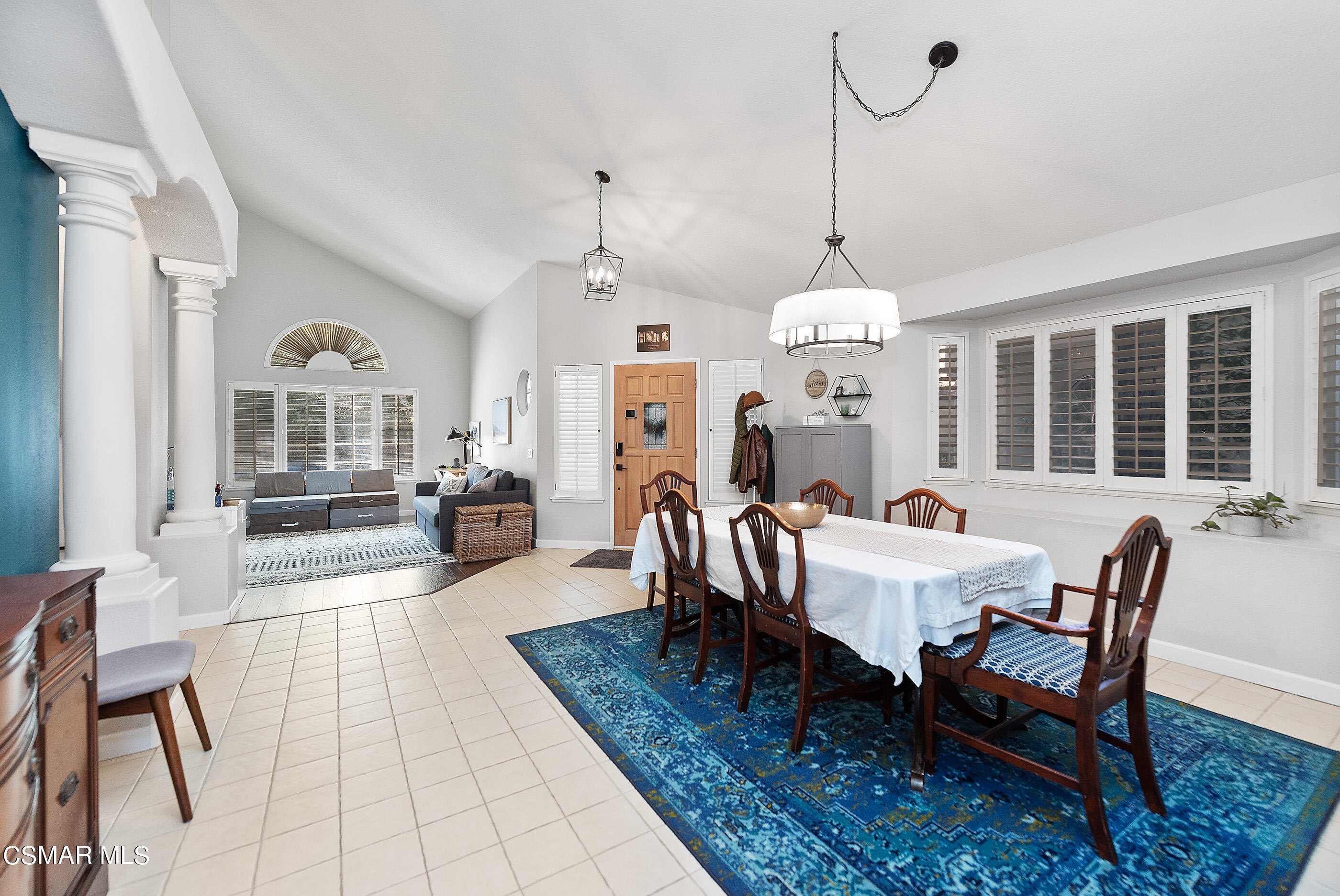 472 Fresh Meadows Road Simi Valley, CA 93065 - Photo 7 of 33 a dining room with furniture a chandelier and wooden floor