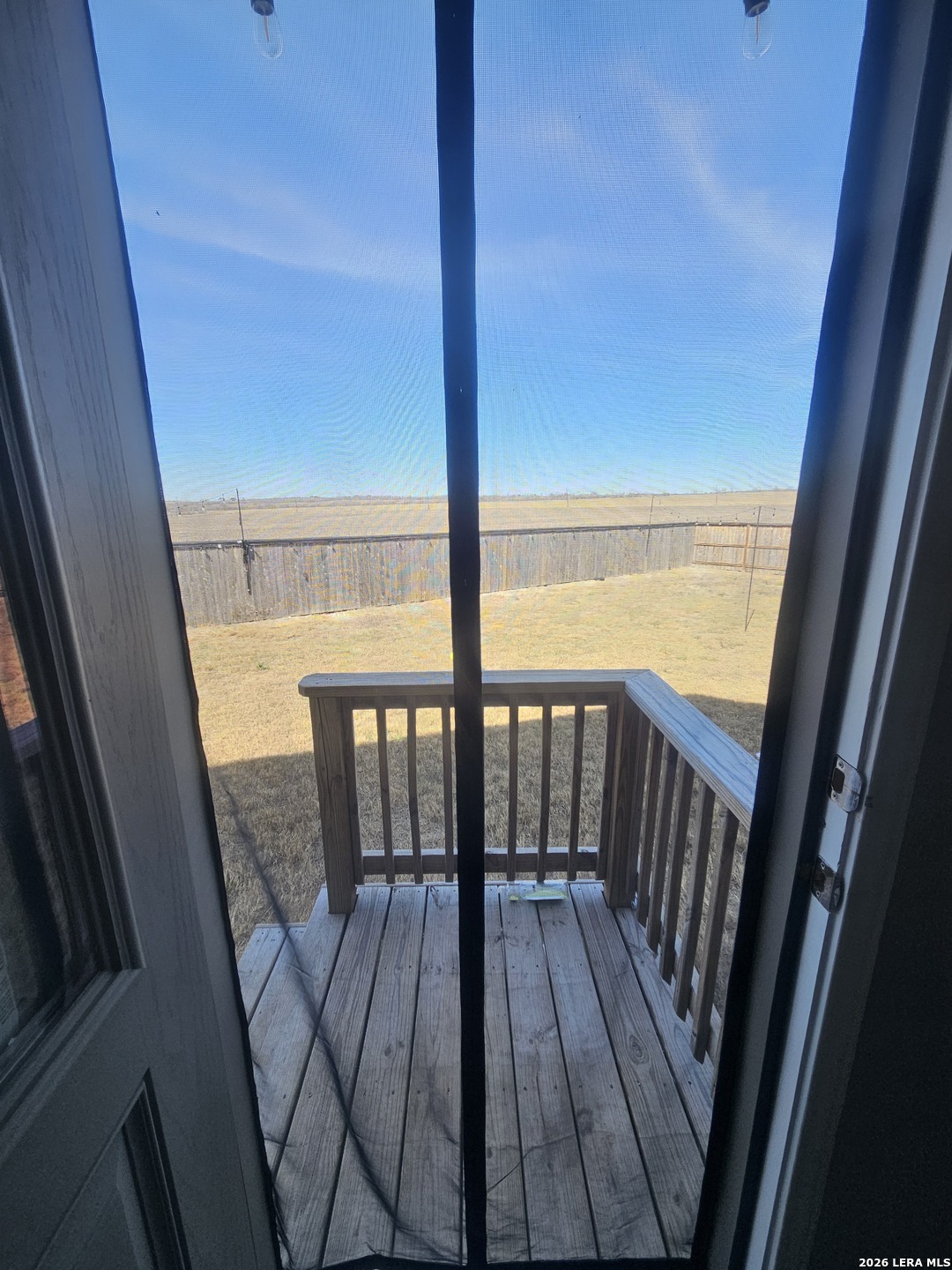 6855 Burgess Ridge Converse, TX 78109 - Photo 20 of 24 a view of balcony with wooden floor