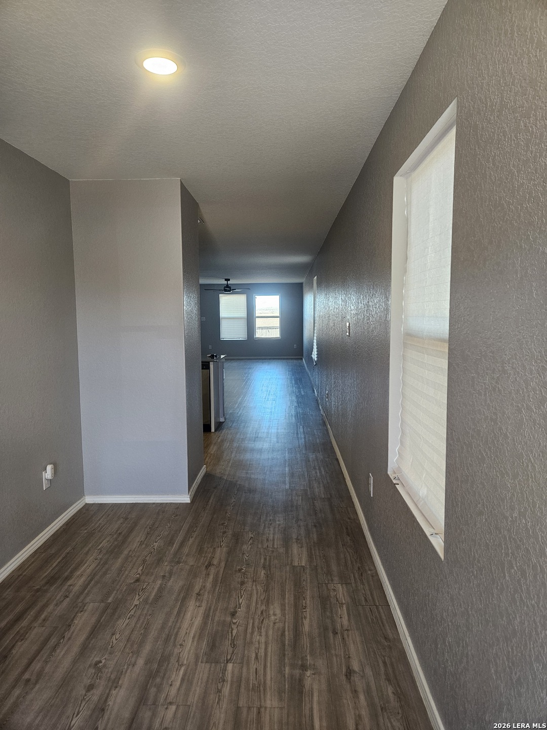 6855 Burgess Ridge Converse, TX 78109 - Photo 2 of 24 a view of gallery with wooden floor