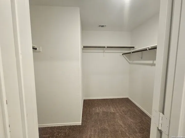 a view of small space with racks on the wall