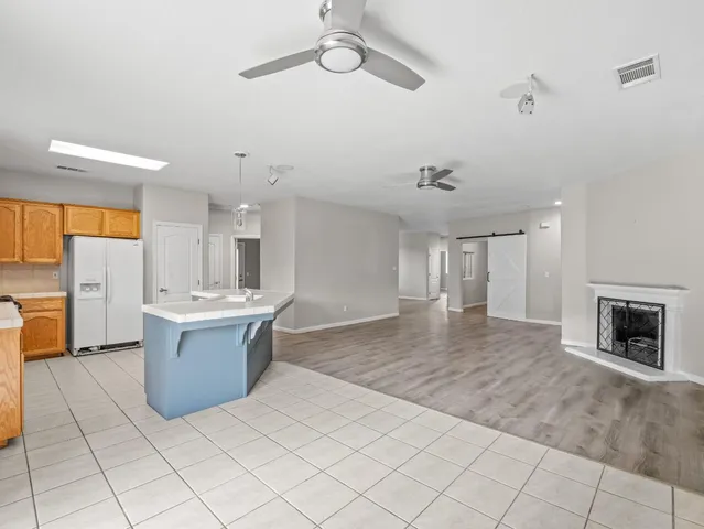 a view of kitchen and windows