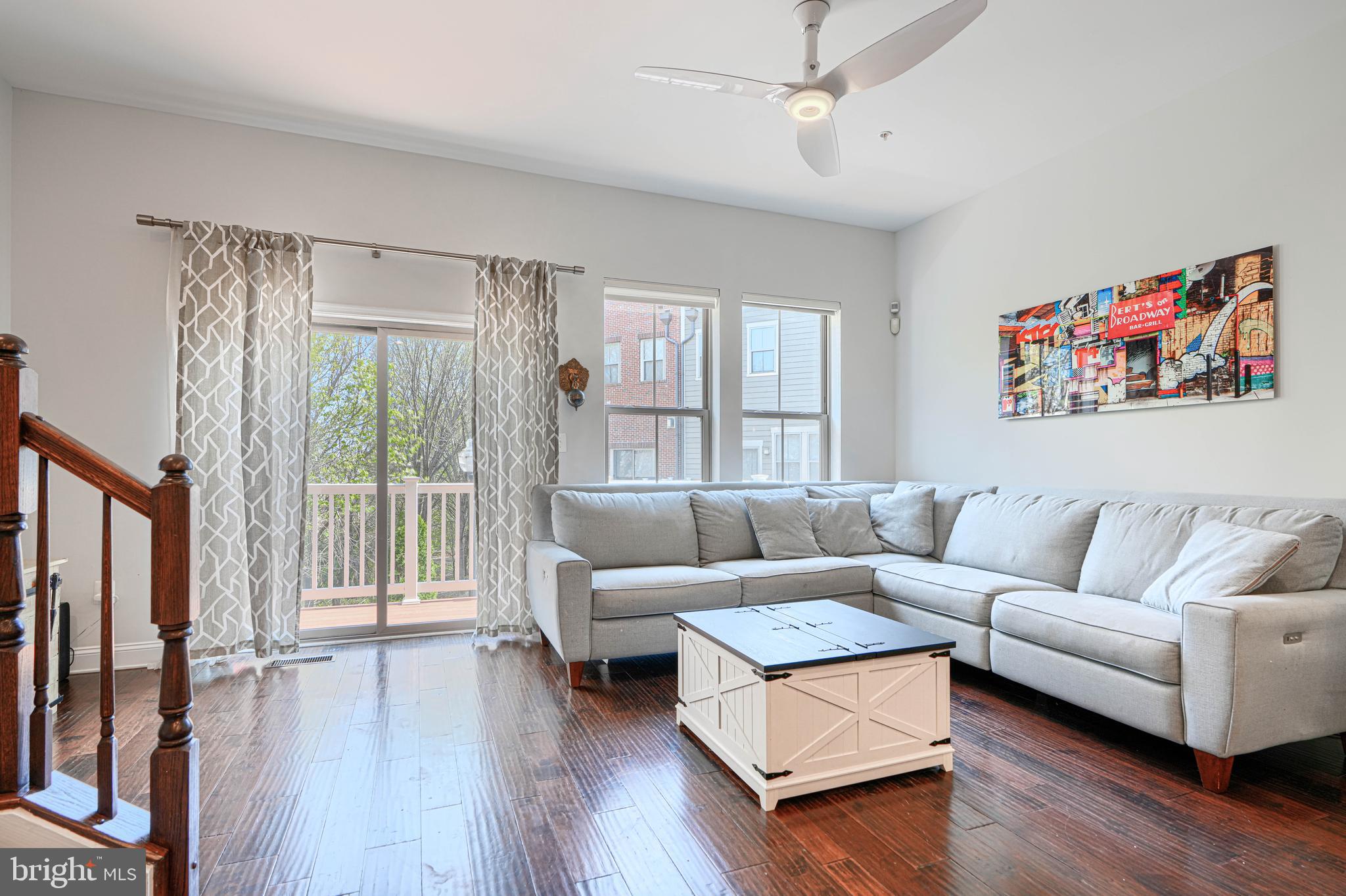 1309 Benjamin Street Baltimore, MD 21230 - Photo 16 of 60 a living room with furniture and a large window