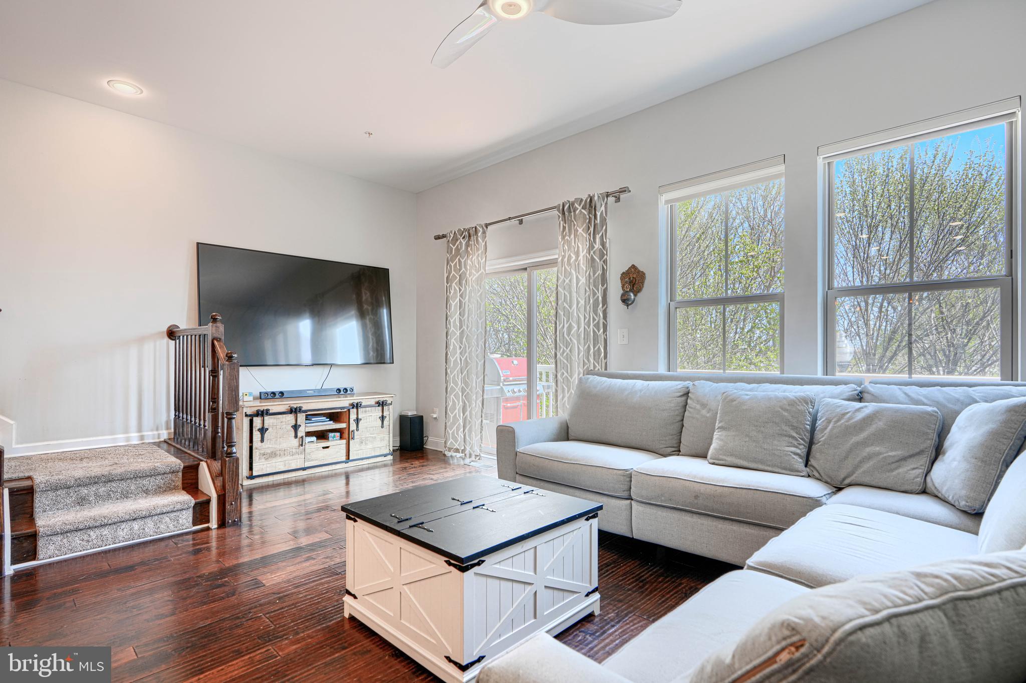 1309 Benjamin Street Baltimore, MD 21230 - Photo 17 of 60 a living room with furniture and a flat screen tv