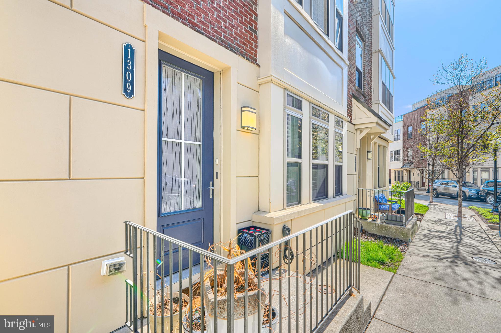 1309 Benjamin Street Baltimore, MD 21230 - Photo 3 of 60 a view of a porch with furniture and floor to ceiling window