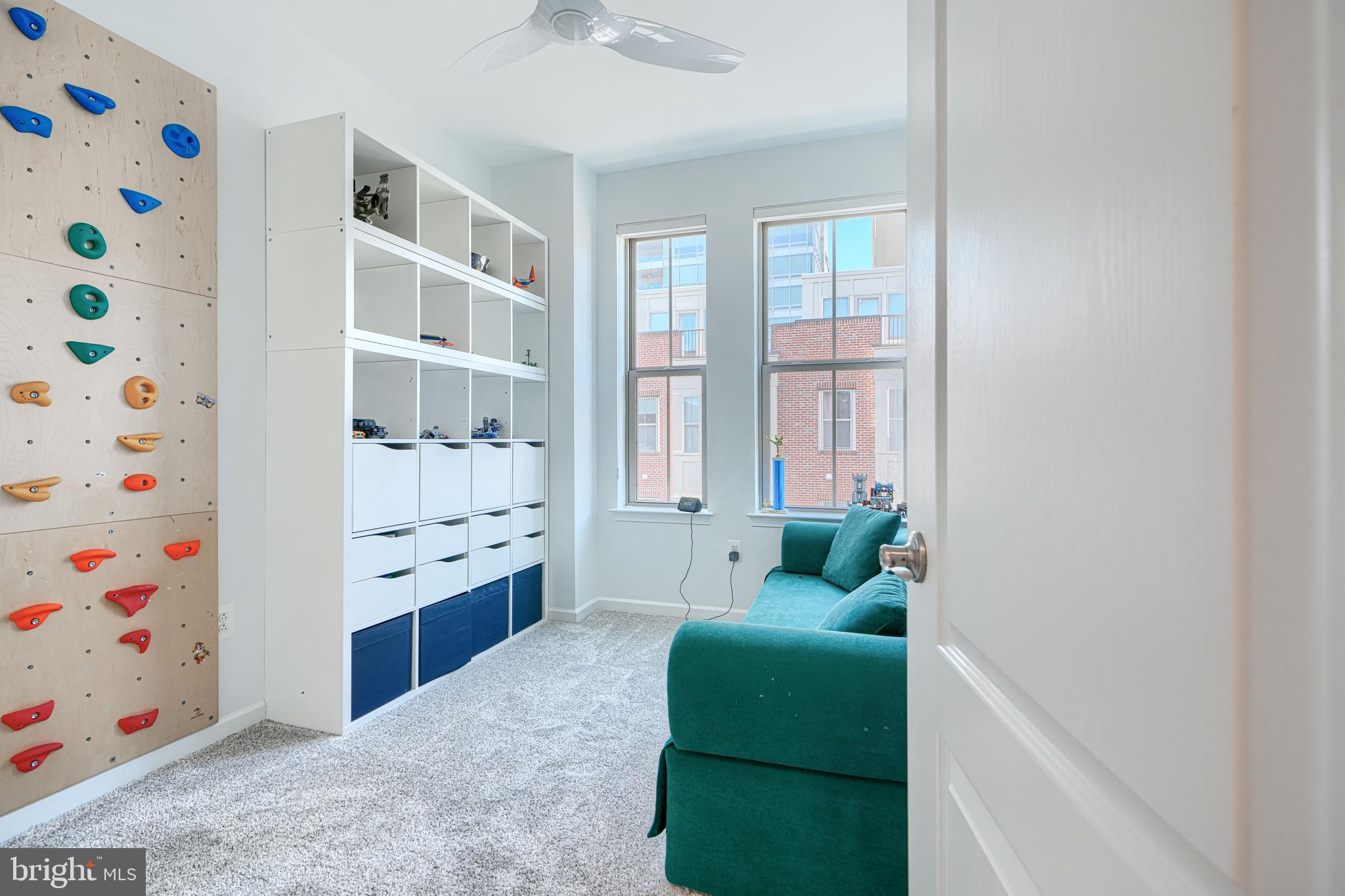 1309 Benjamin Street Baltimore, MD 21230 - Photo 33 of 60 a living room with furniture and a window