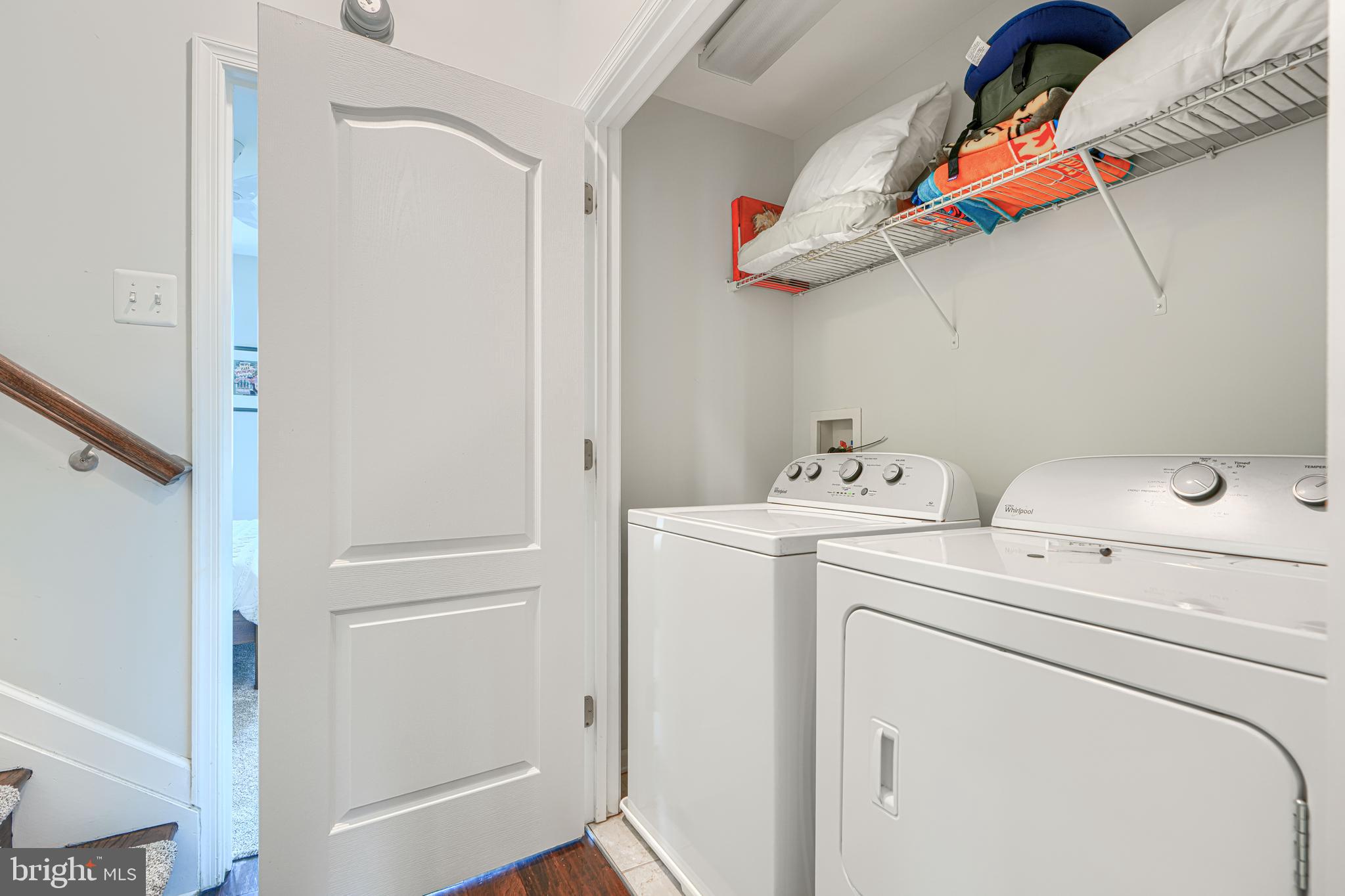 1309 Benjamin Street Baltimore, MD 21230 - Photo 42 of 60 a view of storage and utility room with washer and dryer