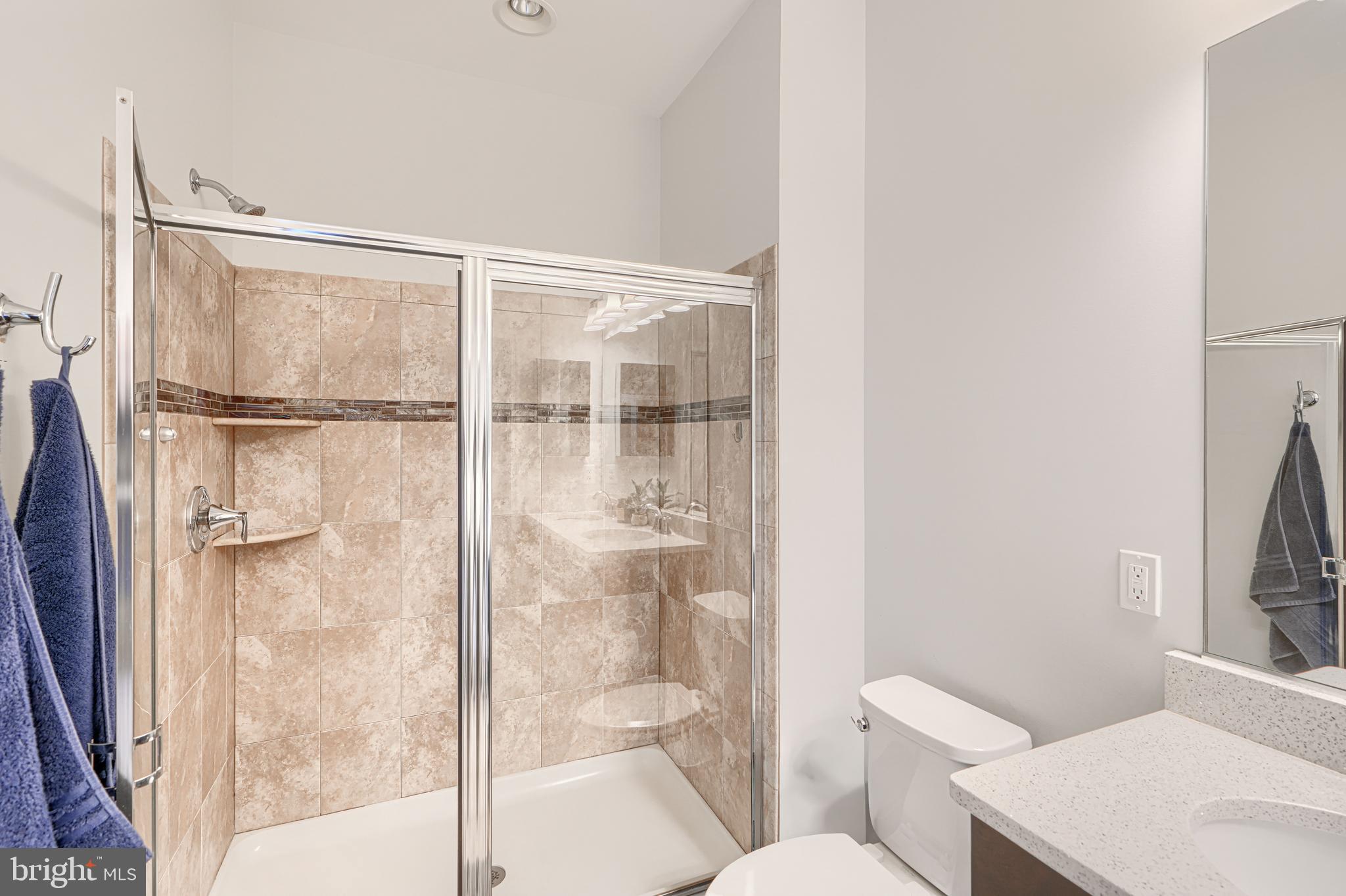 1309 Benjamin Street Baltimore, MD 21230 - Photo 48 of 60 a bathroom with a shower toilet and sink