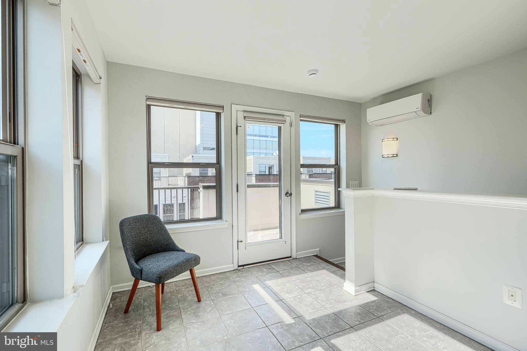 1309 Benjamin Street Baltimore, MD 21230 - Photo 52 of 60 a living room with furniture and a window