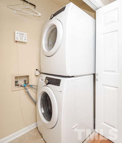 2312 Anihinga Court Raleigh, NC 27616 - Photo 17 of 25 a utility room with dryer and washer