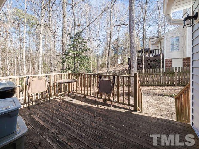 2312 Anihinga Court Raleigh, NC 27616 - Photo 18 of 25 a view of a balcony with wooden floor