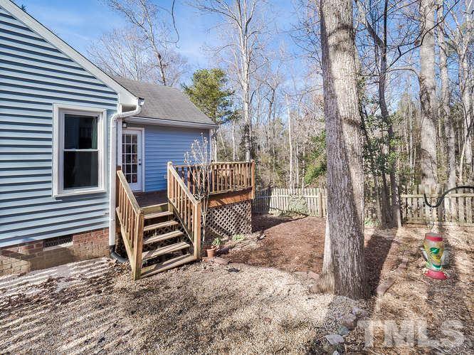 2312 Anihinga Court Raleigh, NC 27616 - Photo 19 of 25 a view of a porch with a bench