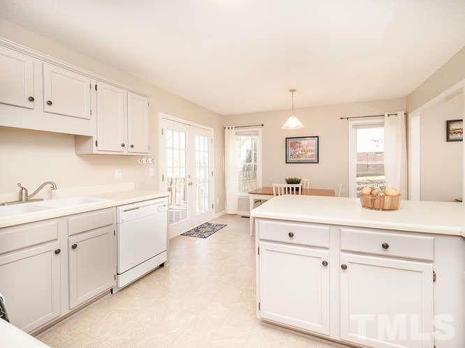 2312 Anihinga Court Raleigh, NC 27616 - Photo 3 of 25 a spacious bathroom with white cabinets and sink