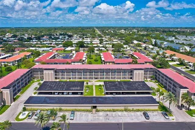 a view of storage and utility room with a window