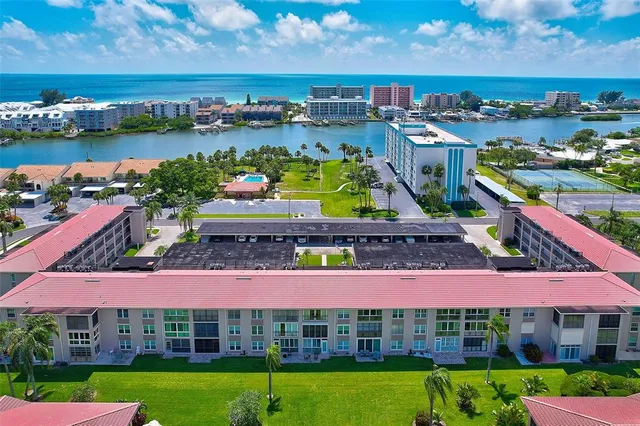 an aerial view of a house with outdoor space