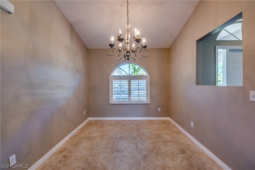 17517 Braddock Road Fort Myers, FL 33967 - Photo 15 of 33 a view of a livingroom with a chandelier fan