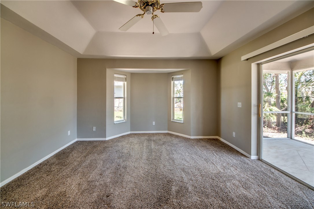 17517 Braddock Road Fort Myers, FL 33967 - Photo 18 of 33 a view of an empty room with a window