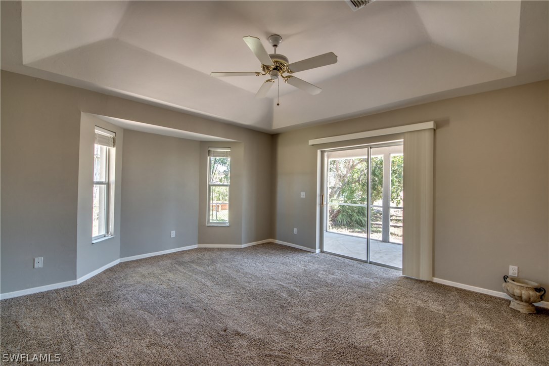 17517 Braddock Road Fort Myers, FL 33967 - Photo 19 of 33 a view of an empty room with a window