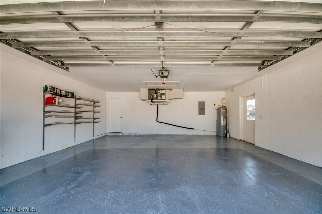 17517 Braddock Road Fort Myers, FL 33967 - Photo 32 of 33 a view of a garage