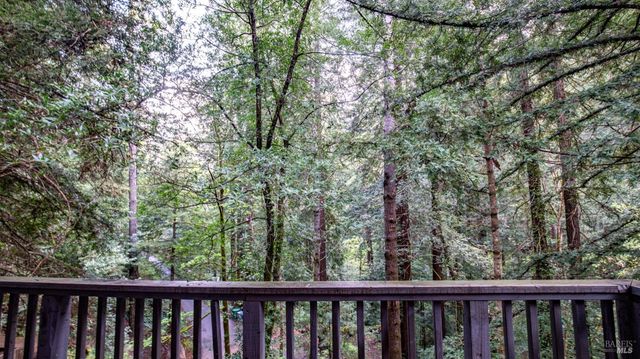 a living room with furniture and a gate