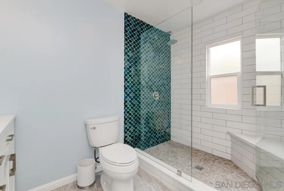 1955 Village Wood Road Encinitas, CA 92024 - Photo 24 of 31 a white toilet sitting next to a bath tub