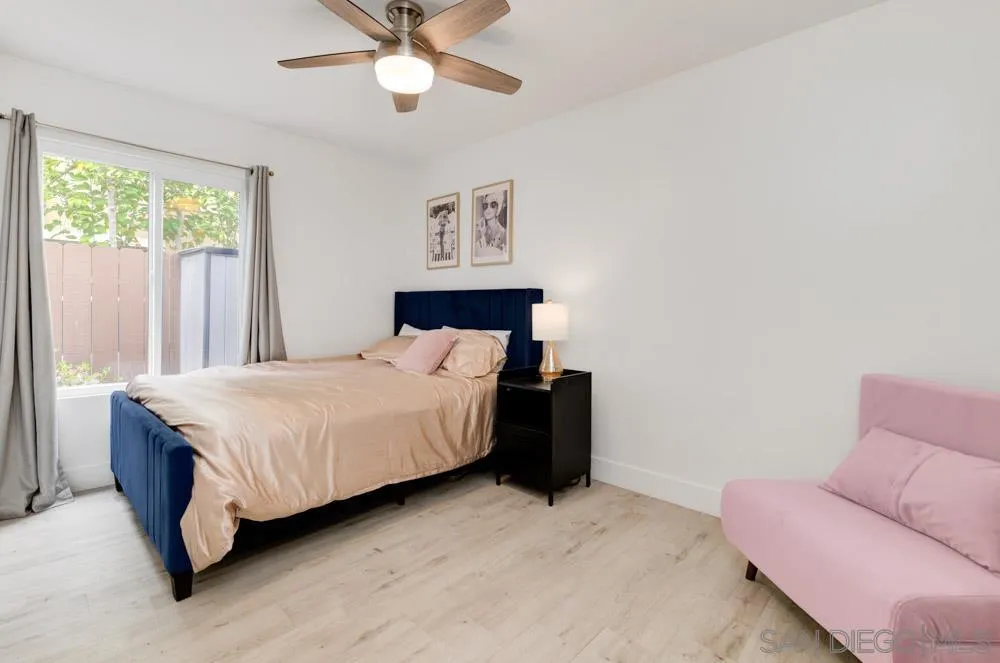 1955 Village Wood Road Encinitas, CA 92024 - Photo 29 of 31 a bedroom with a bed and window