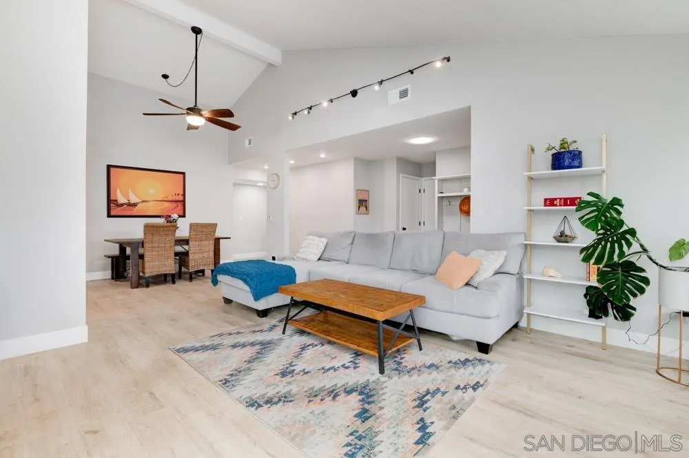1955 Village Wood Road Encinitas, CA 92024 - Photo 4 of 31 a living room with furniture and a chandelier