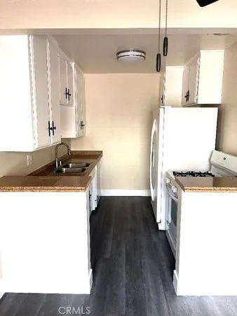 a view of a kitchen with sink