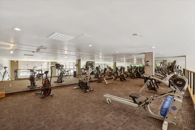 a dining room with furniture window and outside view