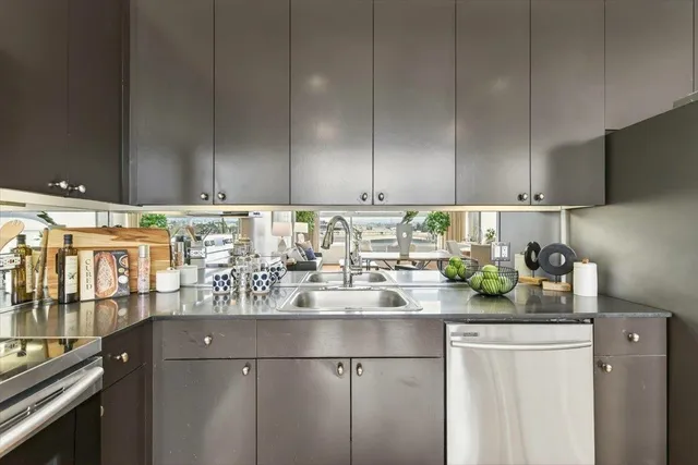 a view of a swimming pool with outdoor seating