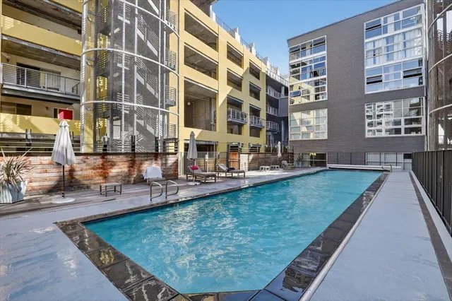 a view of a city street lined with buildings