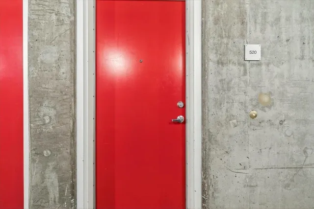 a view of a bathroom with a tub and mirror