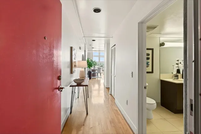 a view of a kitchen from the hallway