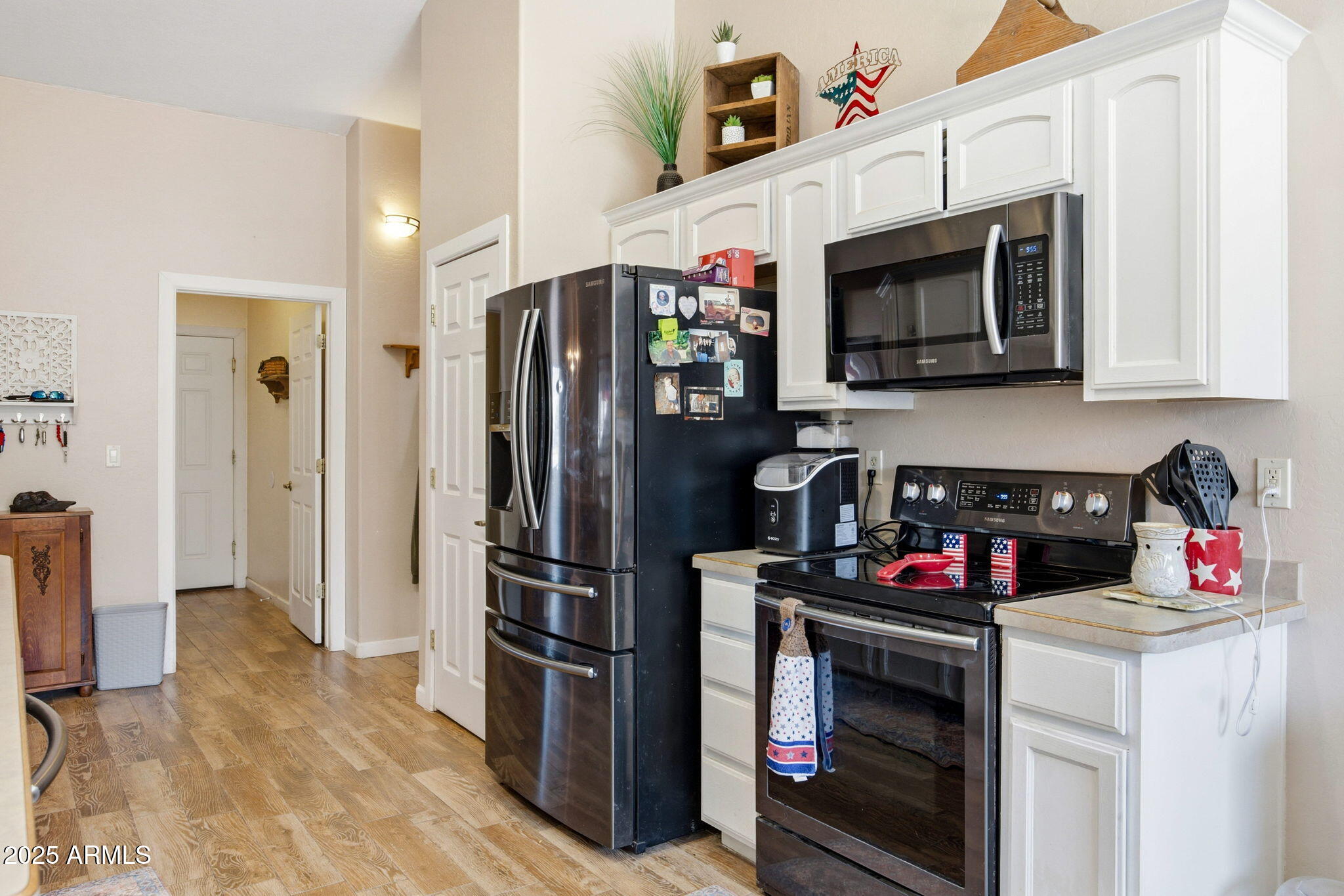 1880 West Merrill Show Low, AZ 85901 - Photo 14 of 31 a kitchen with stainless steel appliances granite countertop a refrigerator stove and sink