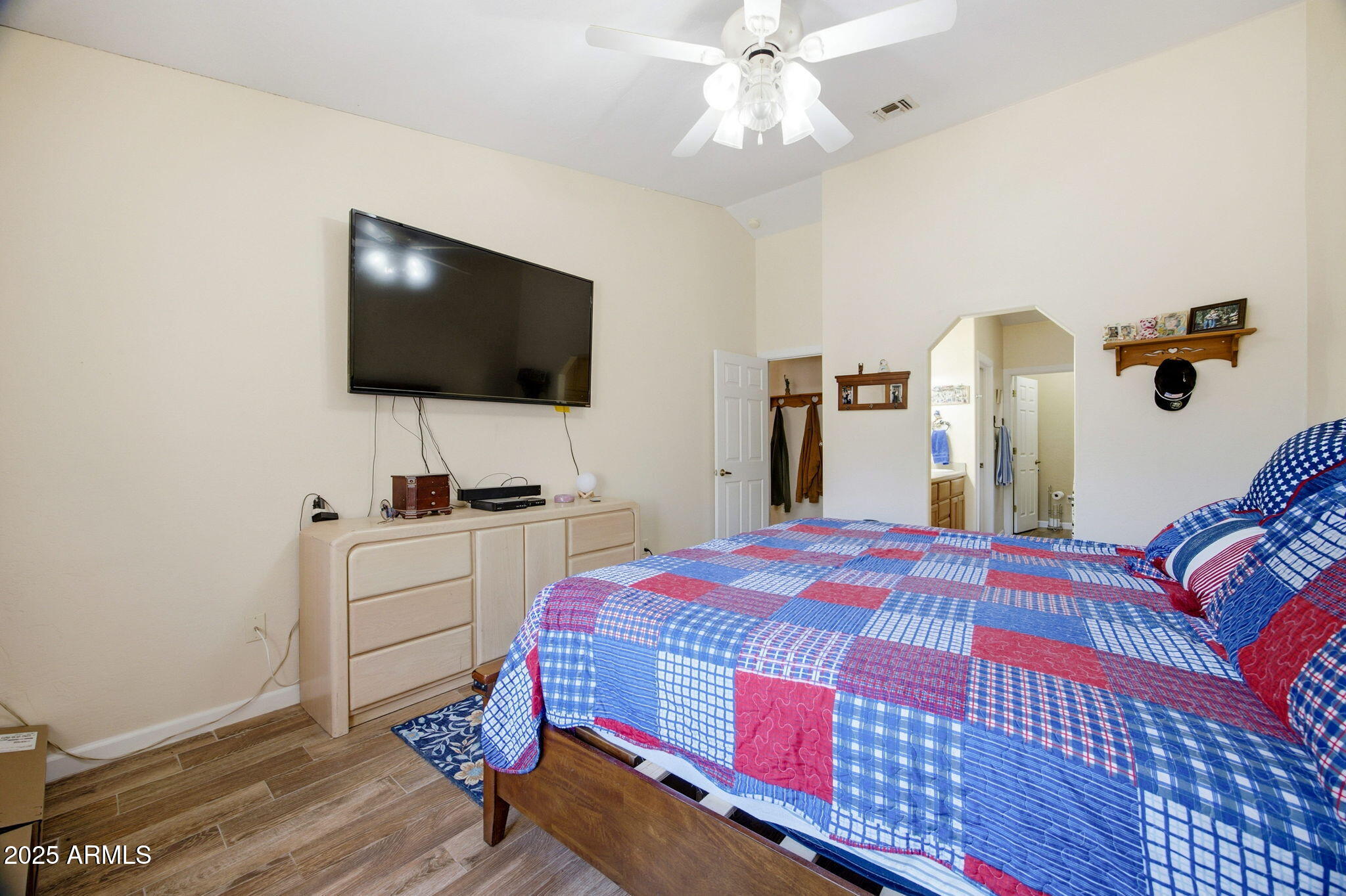 1880 West Merrill Show Low, AZ 85901 - Photo 19 of 31 a bedroom with a bed and a flat screen tv