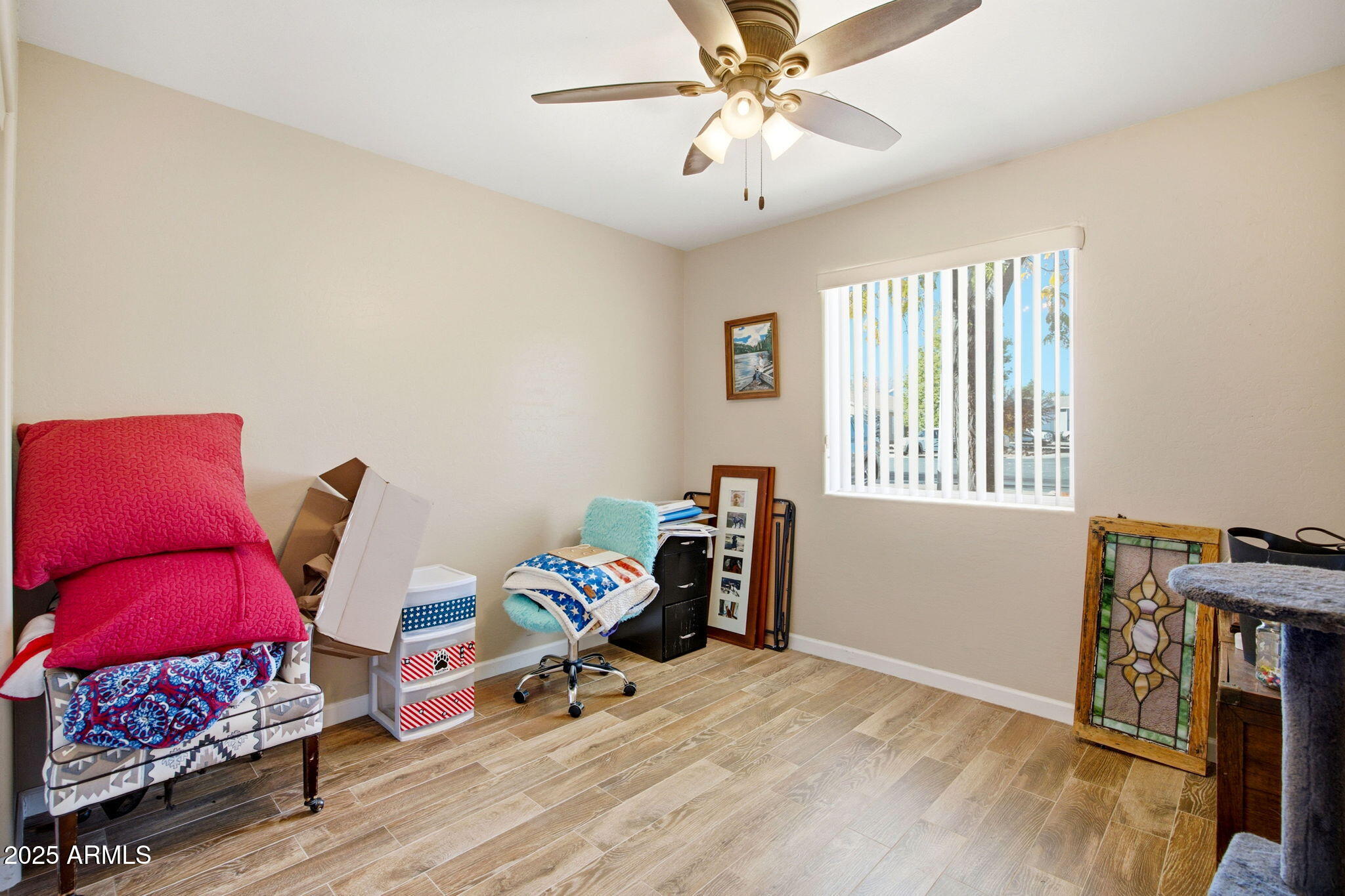 1880 West Merrill Show Low, AZ 85901 - Photo 24 of 31 a bedroom with furniture and a window