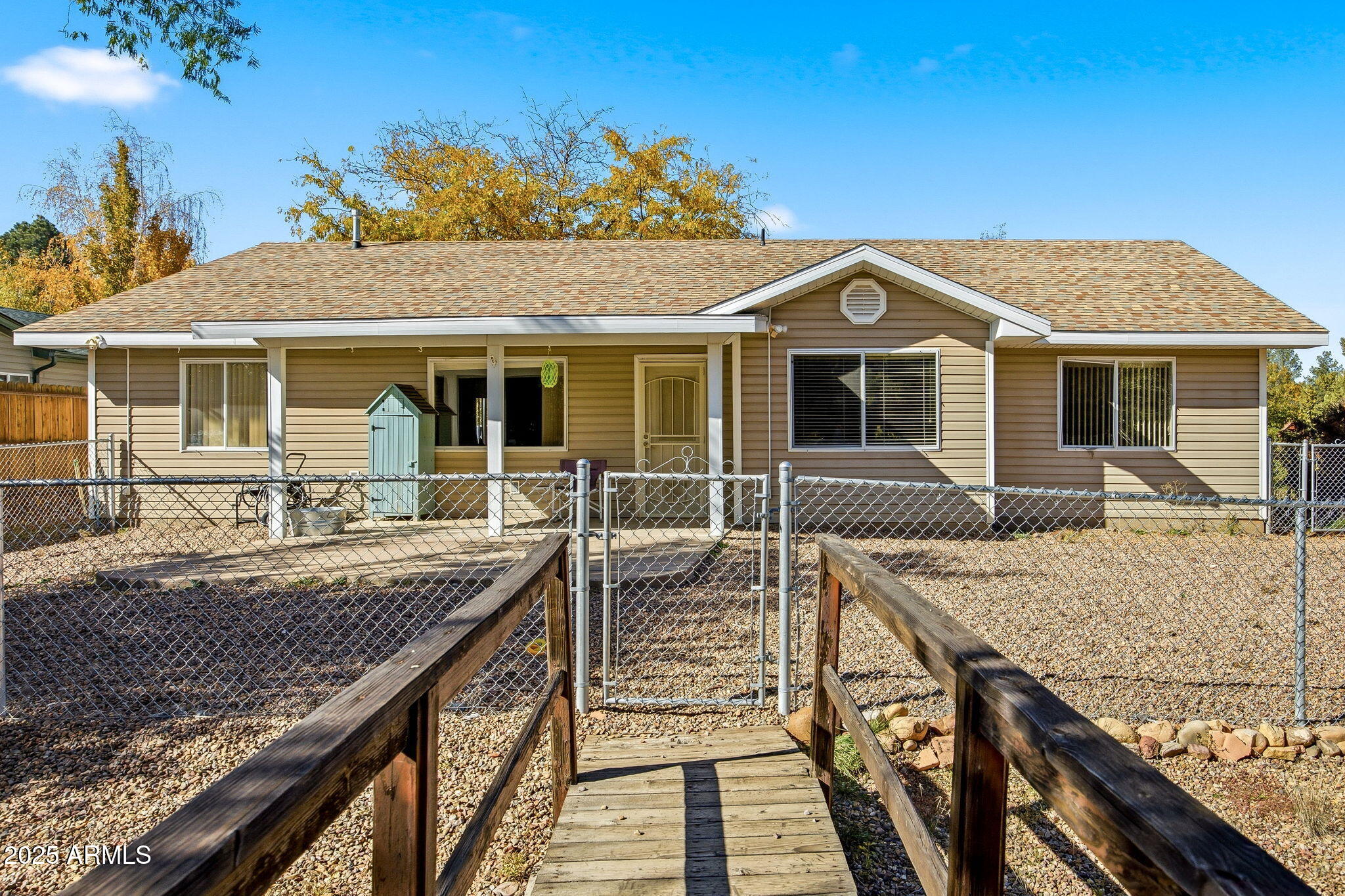1880 West Merrill Show Low, AZ 85901 - Photo 6 of 31 a view of a house with pool and chairs