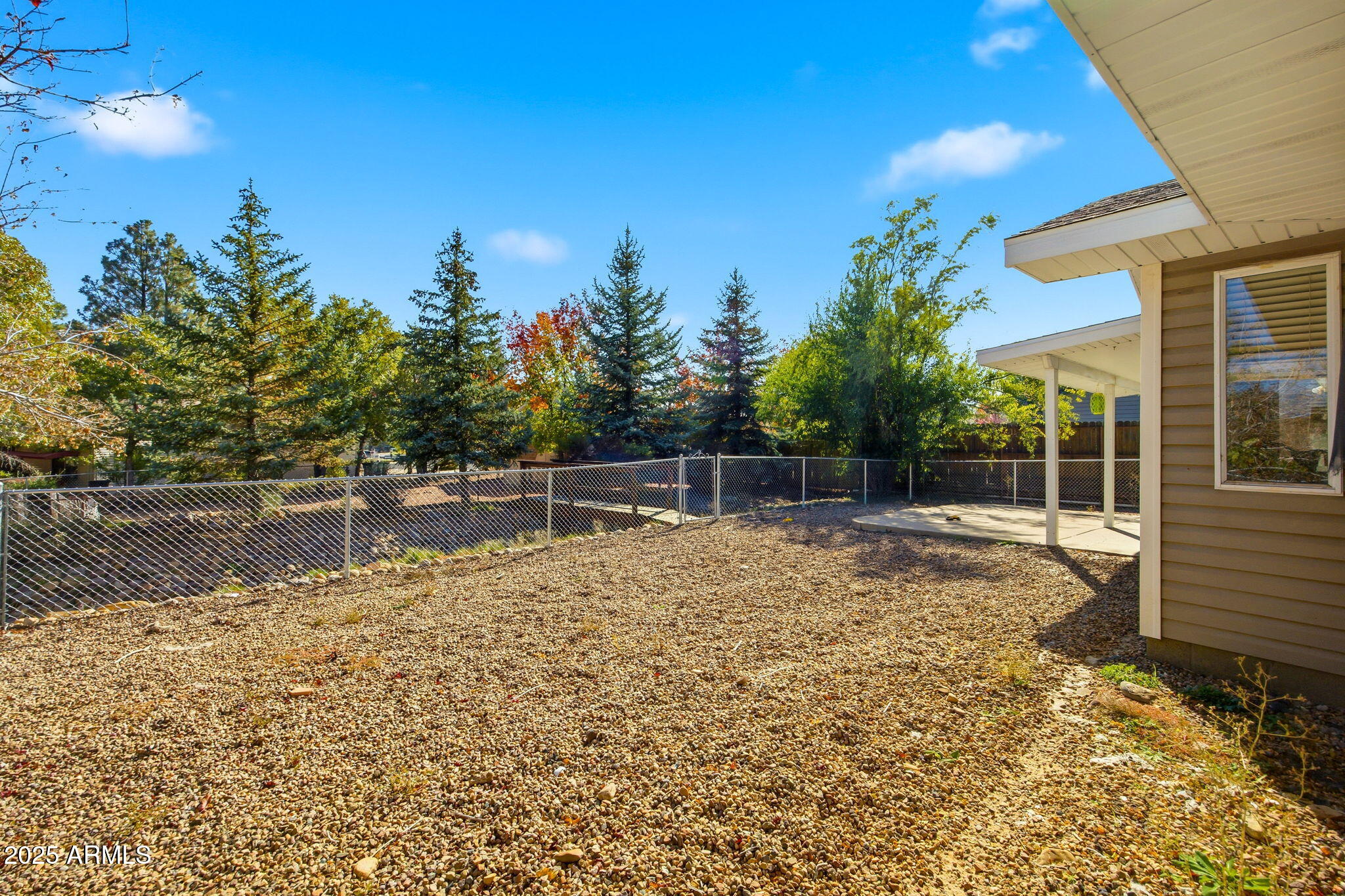 1880 West Merrill Show Low, AZ 85901 - Photo 9 of 31 a view of a lake with a house