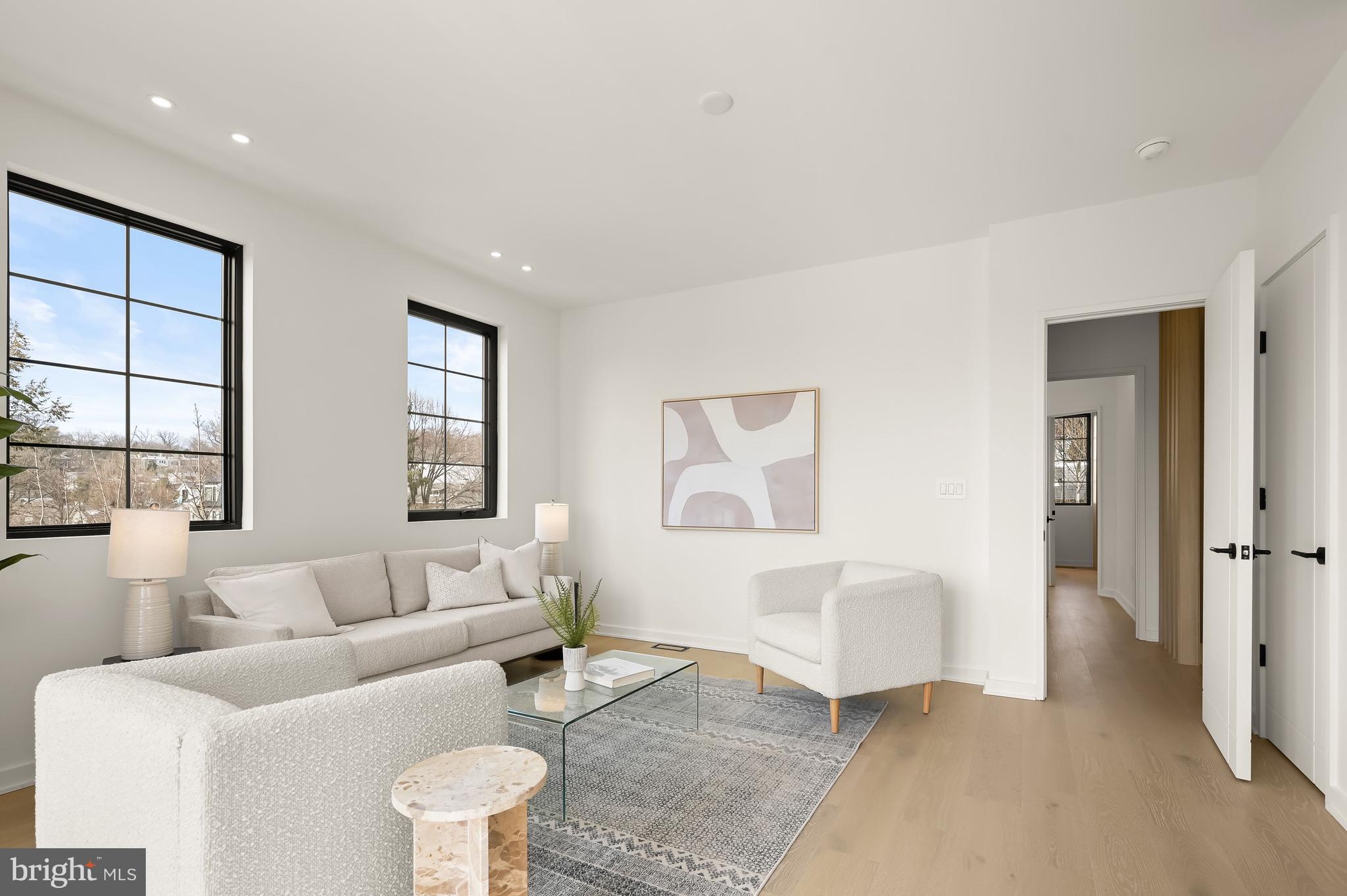 3554 T Street Northwest Washington, DC 20007 - Photo 39 of 57 a living room with furniture and a large window
