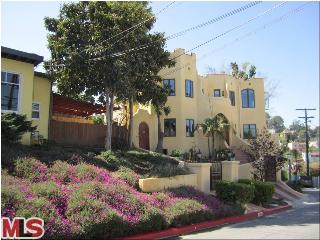 1134 Berkeley Drive Glendale, CA 91205 - Photo 1 of 1 a front view of a house with a yard and tree