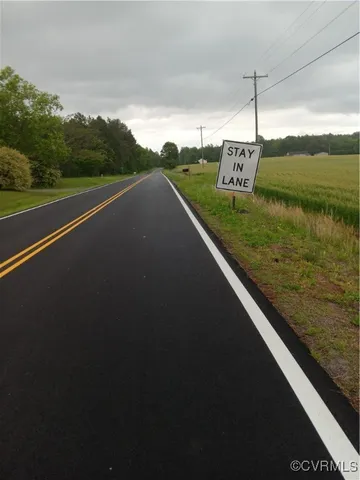 a view of a balcony with a garden