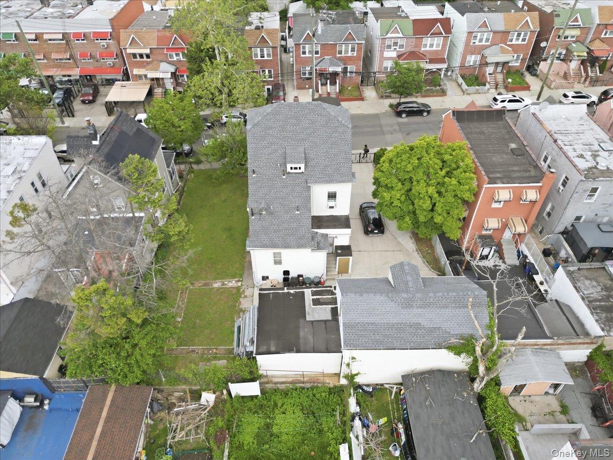 844-48 East 215th Street Bronx, NY 10467 - Photo 11 of 13 an aerial view of residential houses with outdoor space