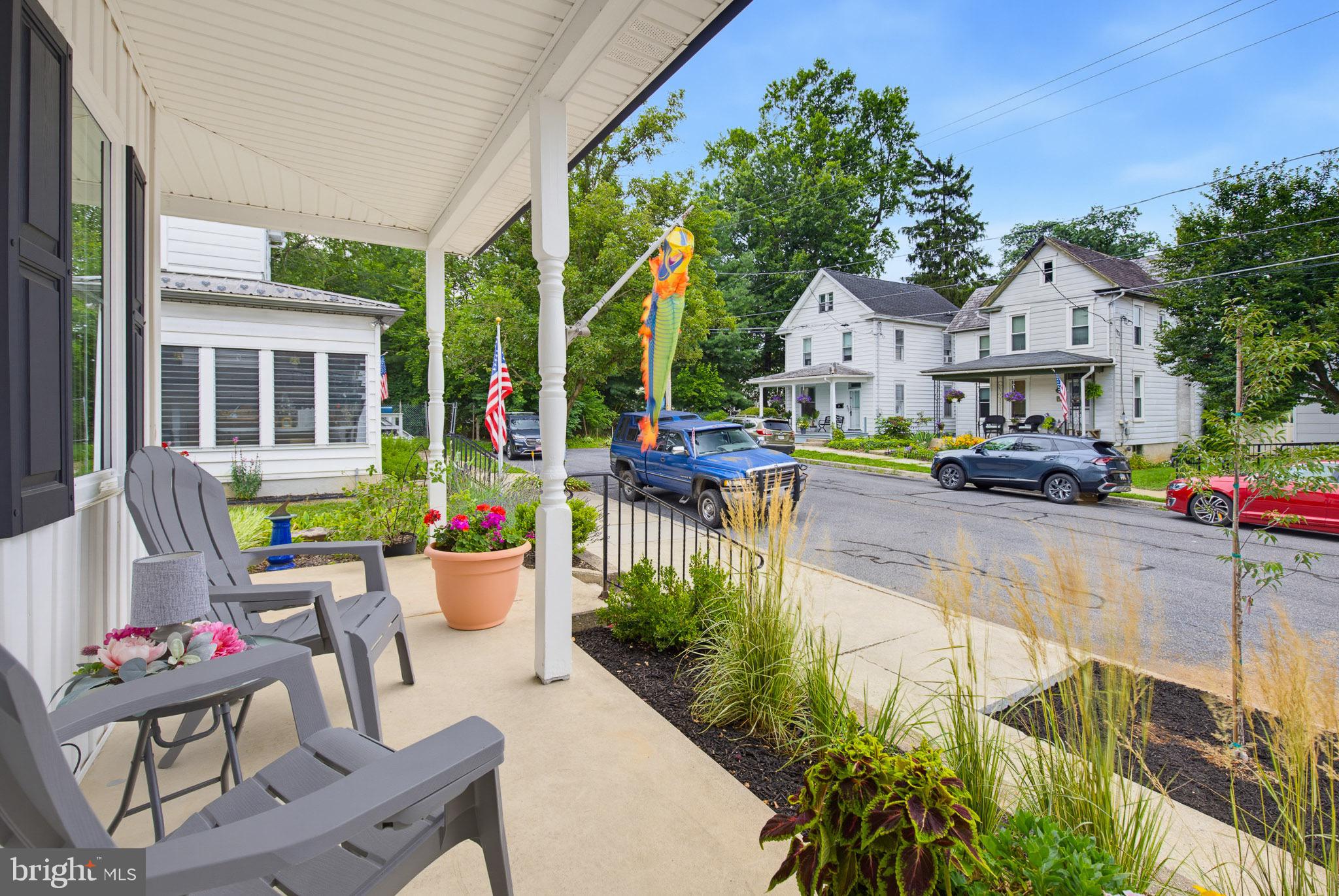 20 Willow Street Lititz, PA 17543 - Photo 9 of 44 a view of a patio with couches table and chairs and potted plants