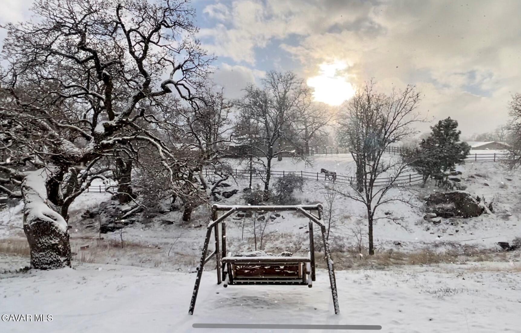 27200 Bear Valley Road Tehachapi, CA 93561 - Photo 46 of 48 a view of a backyard with wooden fence