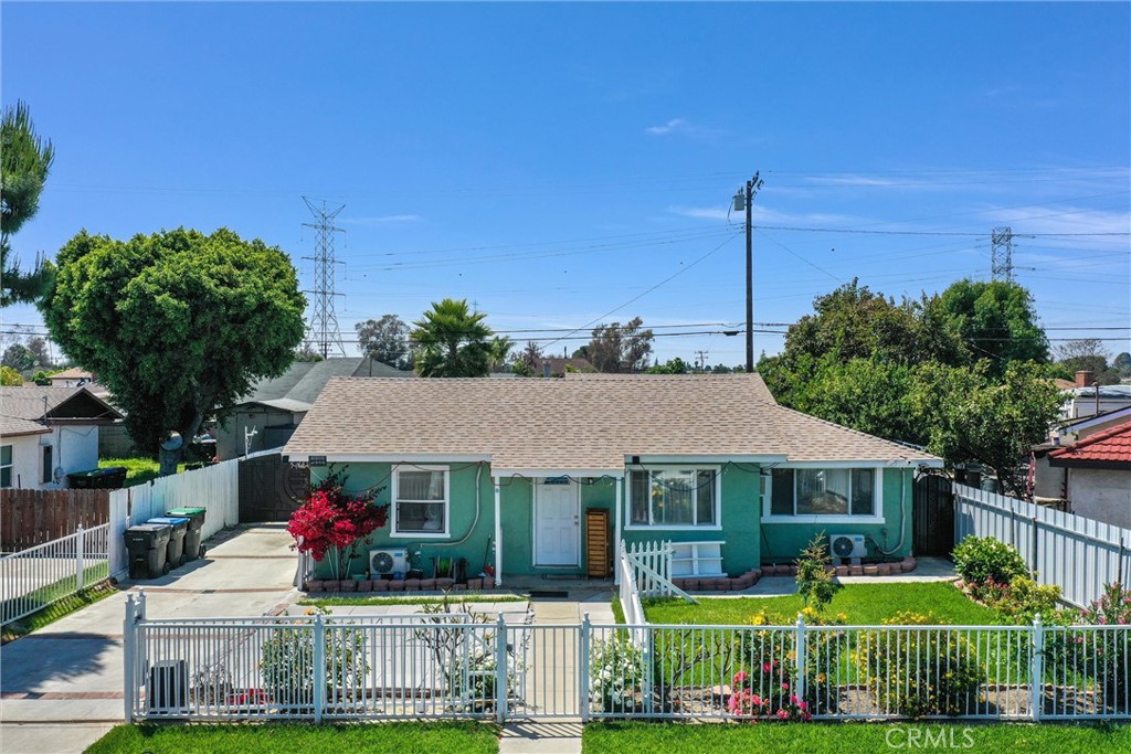 521 Obar Drive La Puente, CA 91746 - Photo 1 of 13 a front view of a house with garden